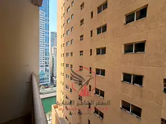 2BR + living in Al Majaz 3 with balcony, gym & pool access, prime vibrant location near all services