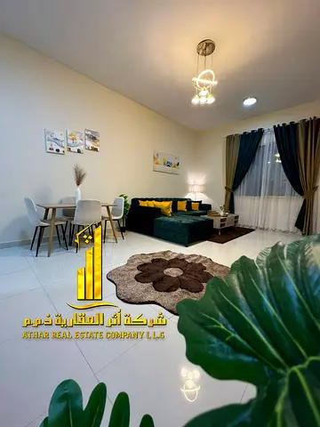 Luxury one-bedroom apartment with a balcony and open views. Ajman, Al Rawda. Fully furnished, available for monthly rent. ✨ Rent includes