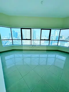Spacious 3 BHK Apartment with Master Bedrooms for Rent in Al Khan, Sharjah | Free Parking & Gym