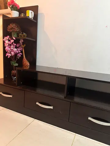Dark wood entertainment TV unit with shelves and drawers