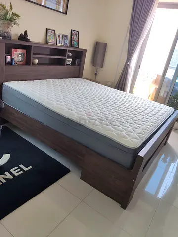 King wooden bed frame with headboard shelving, storage and mattress