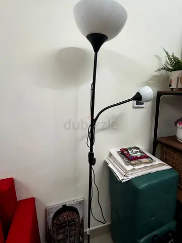 Black metal floor lamp with dual adjustable heads