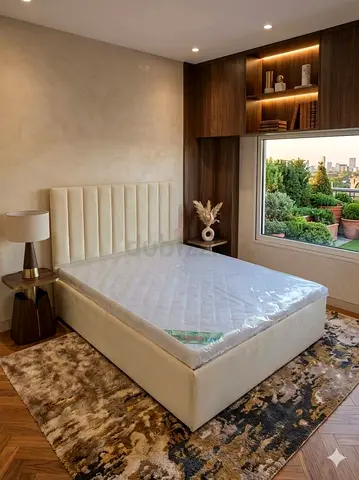 We are selling brand new queen size bed frame with mattress available