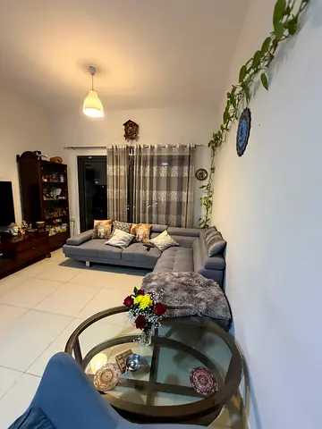 Light grey 3-seater sofa with glass coffee table - good condition