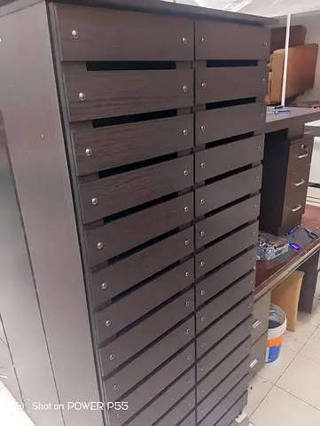 Tall dark wood multi-drawer storage cabinet / organizer