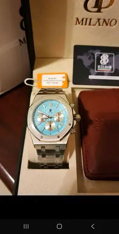 Milano stainless steel chronograph watch with turquoise dial - like new