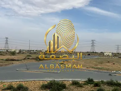 Industrial land for sale in Sharjah, Arqoub Industrial Area, Al Hamriya, with 4 streets, freehold ownership for all nationalities.
