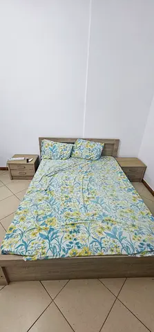 Queen bed with side tables