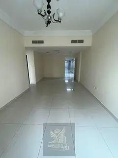 Two-bedroom apartment with a living room for rent in Al Khan, Sharjah. Features a stunning sea view,