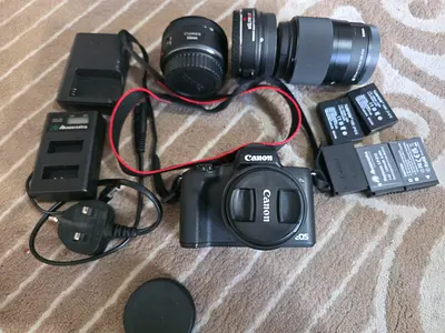Canon EOS M50 mirrorless camera with two lenses and accessories
