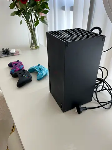 Xbox Series X (1Tb) console with 3 wireless controllers - barely used and in mint condition.