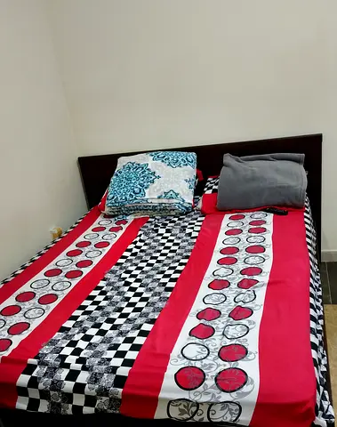 Queen  bed frame with mattress and bedding - good condition