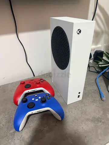 Xbox Series S with two wireless controllers (red & blue) - good condition
