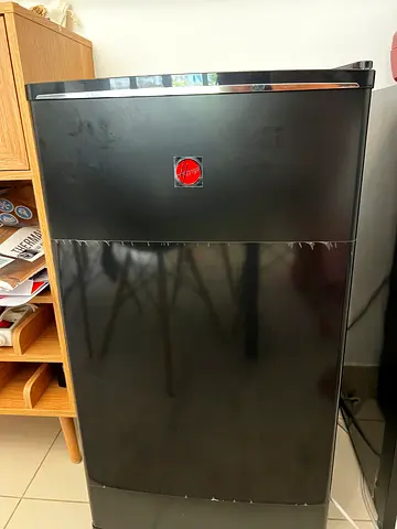 BRAND NEW HOOVER Small black single-door fridge in good working condition 80 cm height 50 cm depth