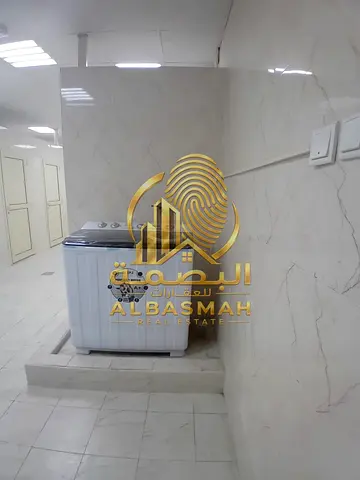 For sale: A prime property in Al Sajaa Al Qadeema, comprising workers' accommodation and two shops. Ownership is open to UAE nationals and GCC citizen