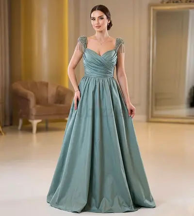 Elegant Sage Green Evening Gown with Beaded Tassel Shoulders