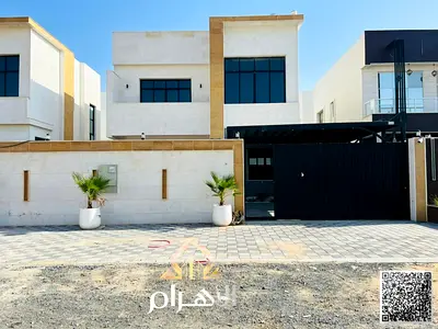 Residential investment villa for sale in Al Helio 2 – Ajman | Super Deluxe finishing | Stone facade | Garden and waterfall