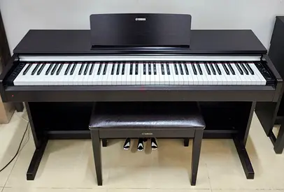 The Yamaha Arius YDP-142R is a home digital piano featuring an 88-key Graded Hammer Standard (GHS)