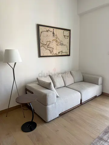 Light grey 3-seater sofa with cushions and side table - excellent condition.