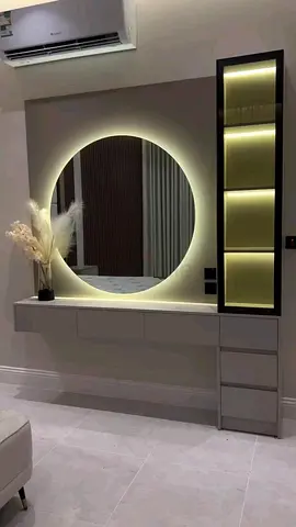 Modern wall-mounted vanity console with illuminated round mirror