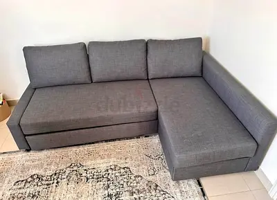 Grey L-shaped Sofa Bed with Storage - Good Condition