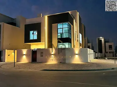 Luxury corner villa for sale in Al Helio 2 – Ajman, modern design and high-end finishes, registration fees included