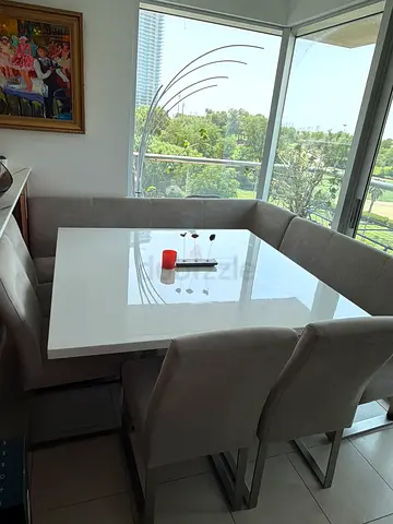 White high-gloss dining table with grey upholstered corner bench and chairs - set
