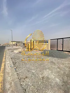 Fenced industrial land for rent with office – Al Sajaa Industrial Area