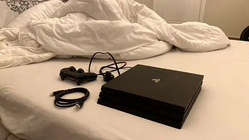 PlayStation 4 Pro (PS4 Pro) with DualShock 4 Controller and Cables - Good Condition