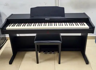 The Roland RP102 is an affordable, 88-key digital home piano featuring an authentic weighted PHA-4
