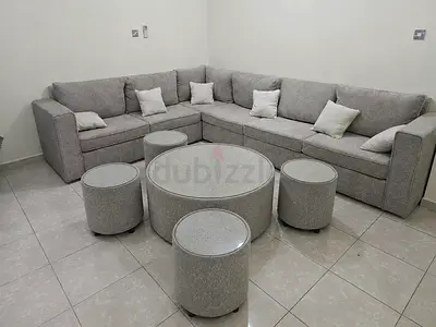 Brand new L shape sofa with tables you can get at the lowes prices