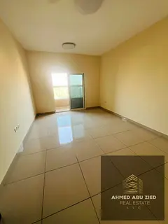 Annual rent 1BR + hall in Al Nuaimiya 1 near Gulfa Bridge, 2 bathrooms, open-view balcony, gym and p