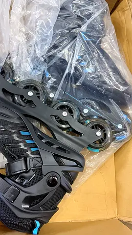 Roller Derby nearly-new inline roller skates - size not labeled (black/blue)
