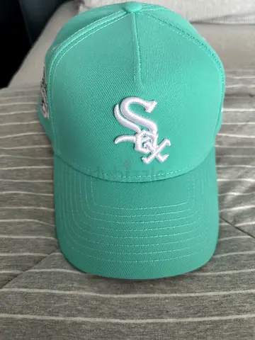 Light Green Embroidered Baseball Cap - Gently Used. Price can be lowered if you want to buy