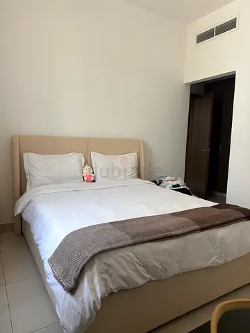 Hello I’m selling my bed with matress Beige upholstered double bed with headboard  V good condition