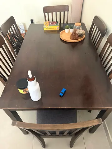 Dark wood dining table with 6 chairs - good condition
