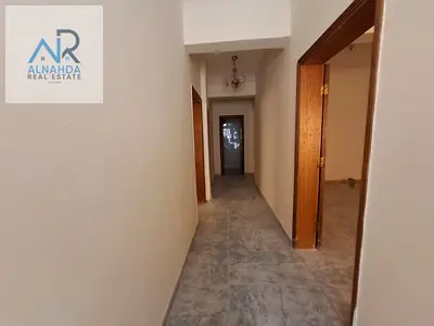Commercial building for sale in Ajman with shops and 3 rooms, located on a main road directly opposite a school, in a prime location near government s