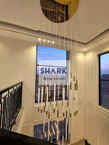 For rent in Al Heliow 2: Furnished unit featuring 6 rooms, a majlis, and a living area. Price: 135,000.
