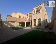 A distinctive villa for rent in Al Muwaihat 3, featuring partial furnishings.
