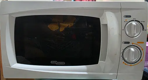 Used white Super General microwave oven - good working condition