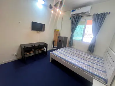 Fully furnished carpeted room with private washroom in Muhaisnah 4