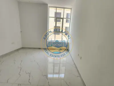 Spacious 1bhk with wardrobes and parking only family building Tilal City Sharjah