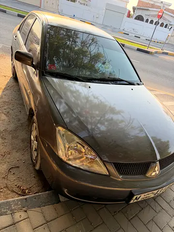 Reliable Mitsubishi Lancer GL 2009 - Japanese Specs - Well Maintained