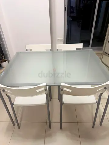 Modern Glass Dining table with 4 chairs