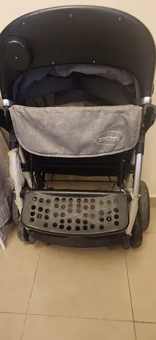 Lightweight grey baby stroller / pram in good condition