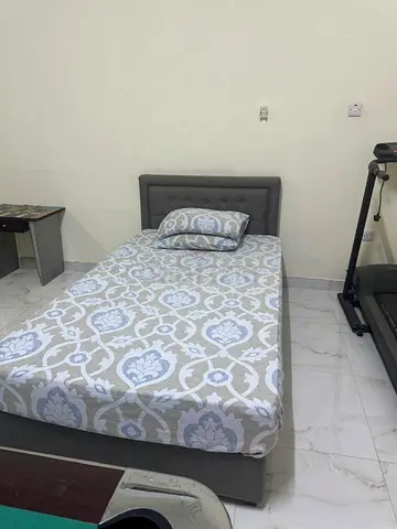 Two Single grey fabric bed with mattress and headboard - good condition