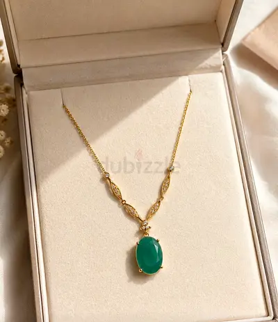 Gold Necklace with Natural Oval Emerald Pendant and Diamond accents