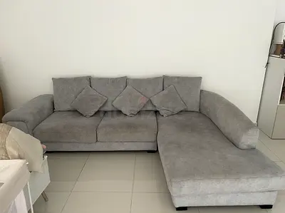 Light grey L-shaped sectional sofa with chaise, good condition