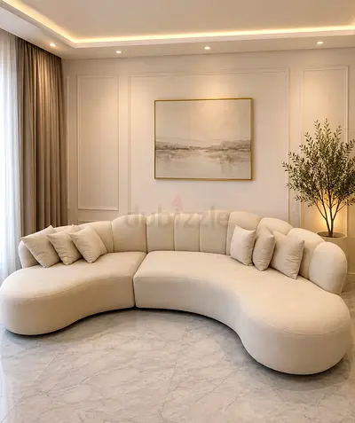 Curved Beige Three-Seater Sofa with Cushions - Modern Design