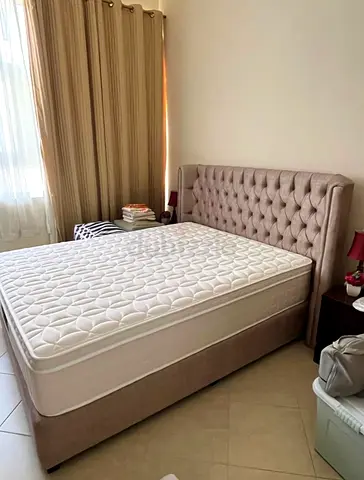 Queen upholstered bed frame with mattress and tufted headboard - Excellent condition